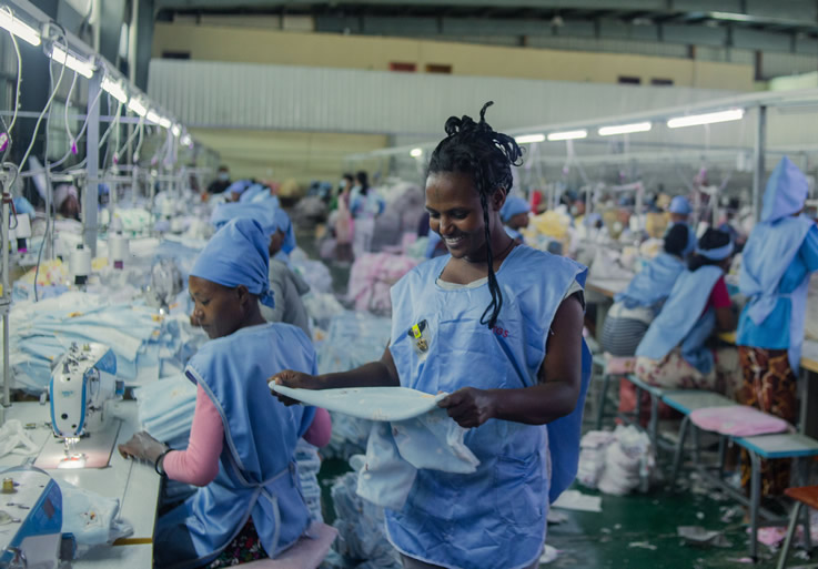 A woman working at a garment factory